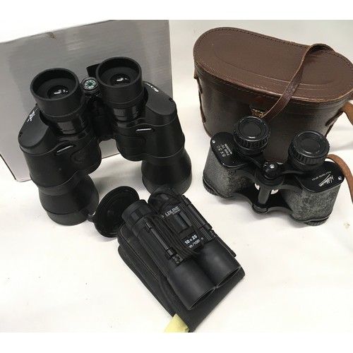 167 - Collection of various binoculars and cameras to include Hanimex and Goodmans.