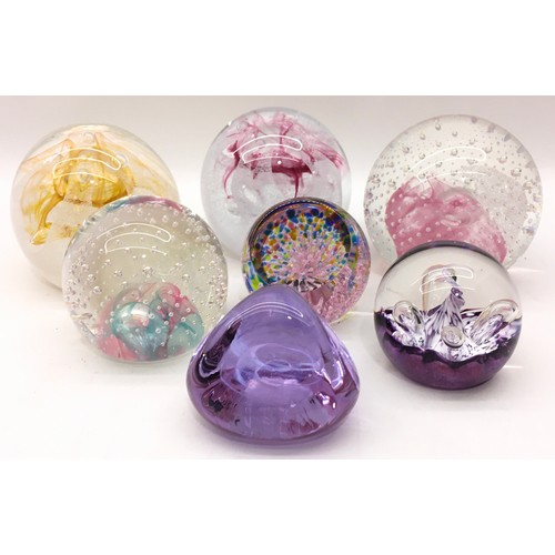 208 - Collection of Caithness paperweights to include 'Pink Champagne', 'Congratulations' (in pink and yel... 