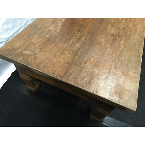 340 - Solid oak coffee table on square legs 148x81x45cm.