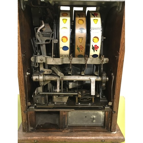 20 - Mills Wolfs/Lions head coin operated slot machine, working on 5 cents with keys etc.