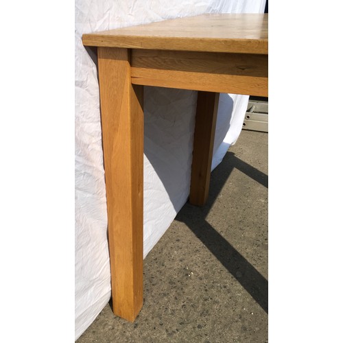 38 - Light oak square kitchen table. 77x77x77cms.