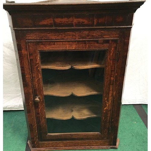 37 - Antique oak corner cupboard with three shelves and glazed front. Wired for internal display lighting... 