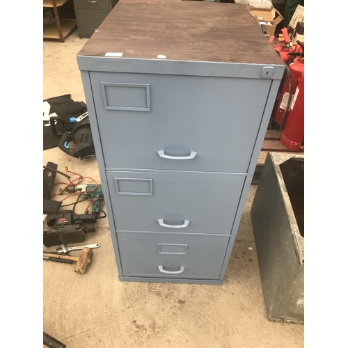 A Purple Painted Three Drawer Metal Filing Cabinet