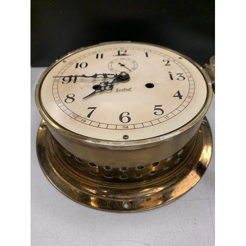 A BRASS SESTREL SHIPS CLOCK