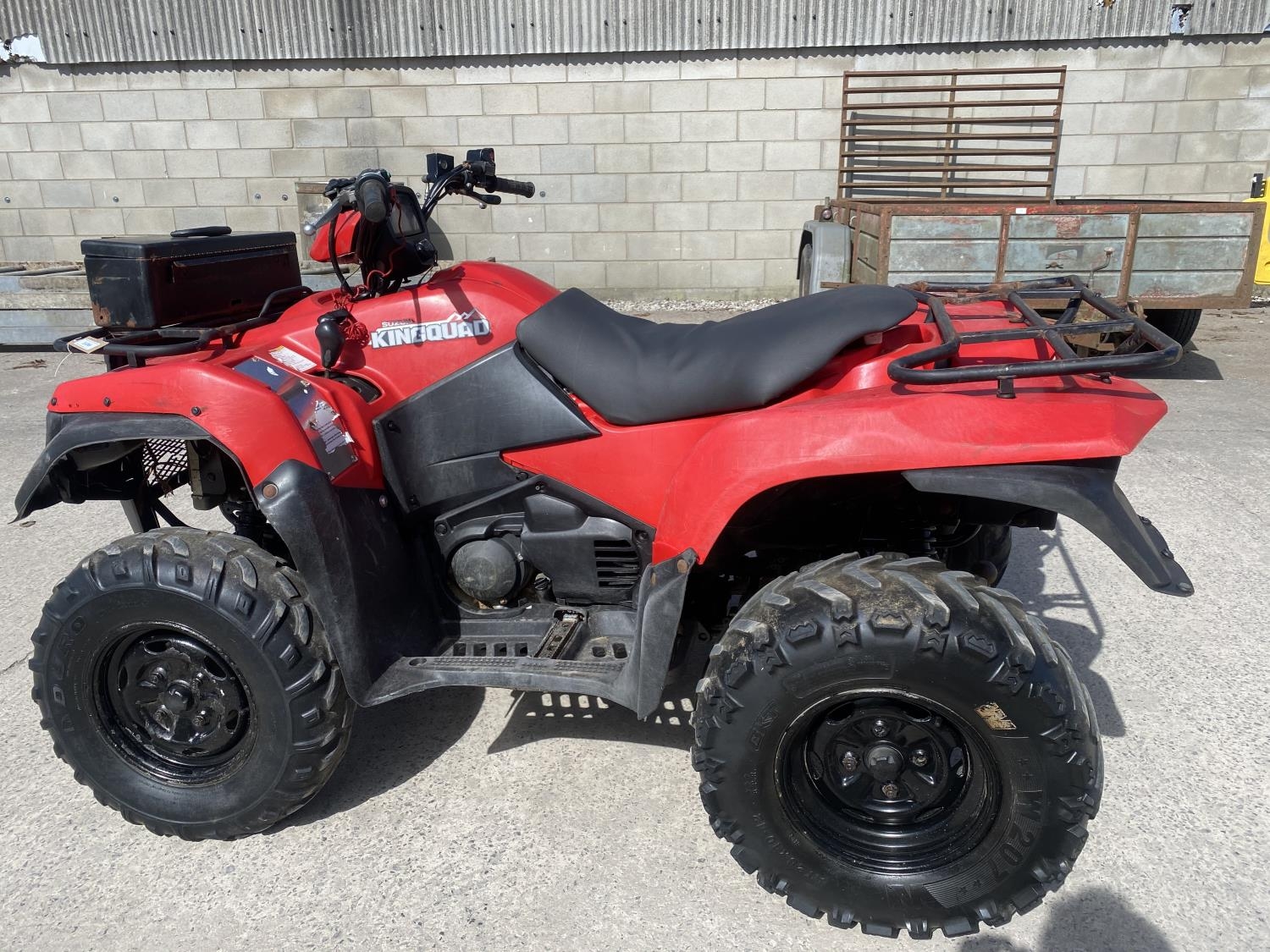 A 2014 SUZUKI KING QUAD, 500 CC WITH POWER STEERING SEE VIDEO OF VEHICLE STARTING AND RUNNING AT
