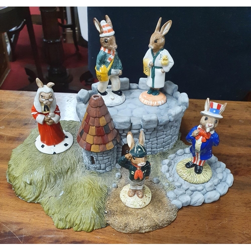 41 - Five Royal Doulton Bunnykins Figures. Uncle Sam, Paperboy, Judge, Bathtime and Be Prepared on stand.