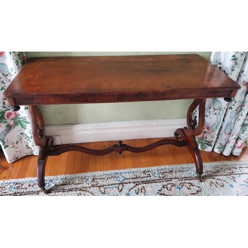 15 - A 19th Century Walnut rectangular Centre Table with an inlaid top, lyre ends and a stretcher base. 1... 