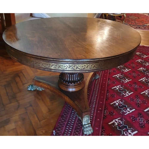 56 - A Magnificent Regency Rosewood circular Centre Library Table with Brass inlay. The Frieze profusely ... 