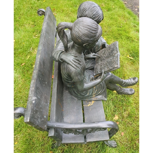 773 - A Fabulous Bronze Sculpture of a Boy and a Girl on a bench reading. H92 x D67 x W100cm approx.