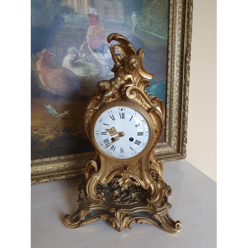 43 - A really good 19th Brass and Ormalu Mantle Clock in the Rococo style.
