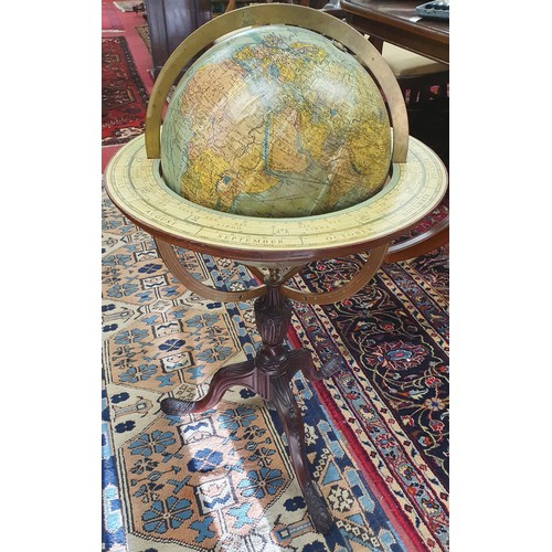 A 19th - early 20th Century Columbus Erdglobus globes on a highly carved tripod base. c1890 - 1910. H 86 x 49 Diam approx.