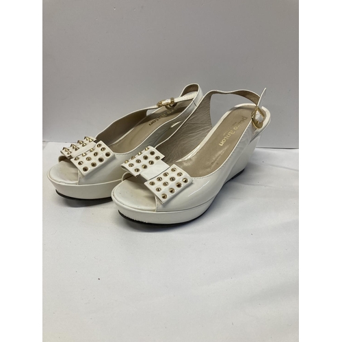 35 - Pedro Anton Cream peep toe Wedges with gold studs and ankle strap. No size marked.