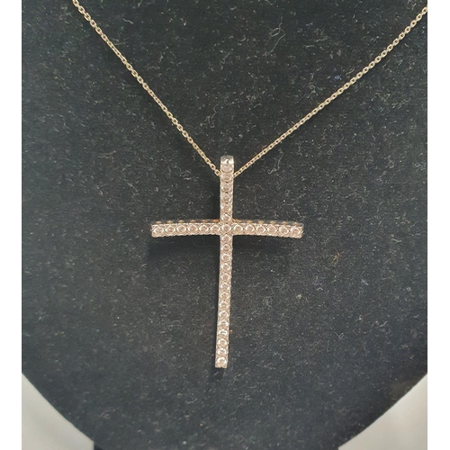 34 - A good 18ct gold and brilliant cut Diamond Cross Necklace, with thirty two Brilliant cut Diamonds.