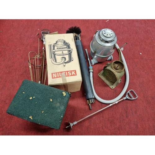 61 - A quantity of Vintage items to include a Nilfisk Vacum cleaner,a quantity of chimney Rods two shooti... 