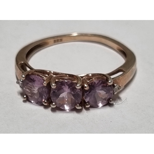 16 - A good three stone dress Ring. Ring size N.