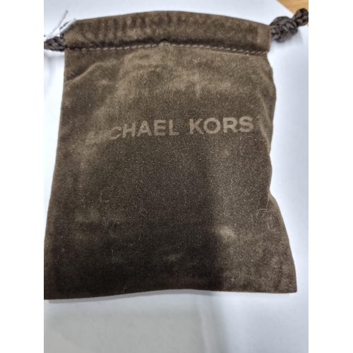 21 - Two as new Michael Kors Bangles in a Michael Kors Bag.