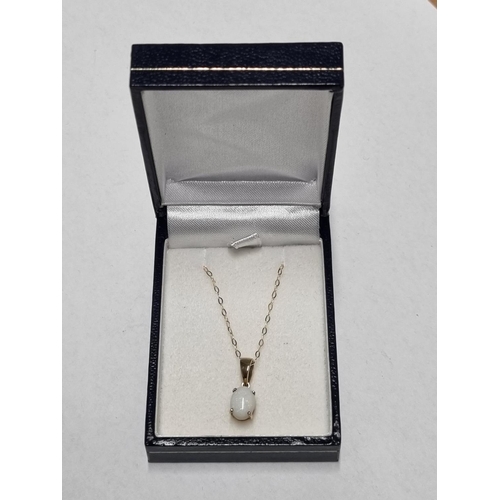 26 - A 9ct Gold and Opel Pendant with Gold Chain.