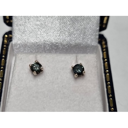 27 - A pair of white Gold and blue Diamond Earrings, Approx Diamond weight .4ct