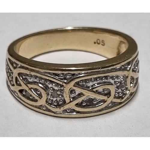 4 - A 9ct Gold and Diamond dress Ring. Ring size R 1/2.