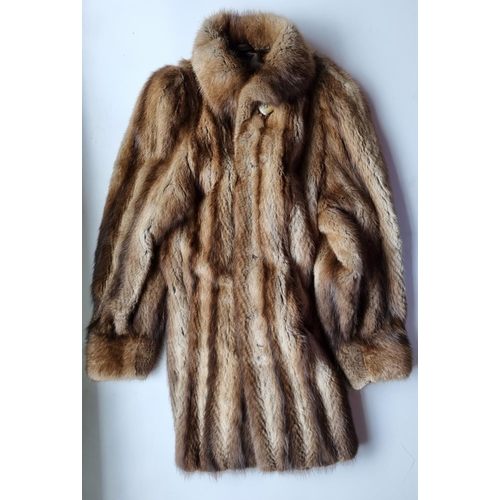 18 - A vintage Cleary's Fur Coat.