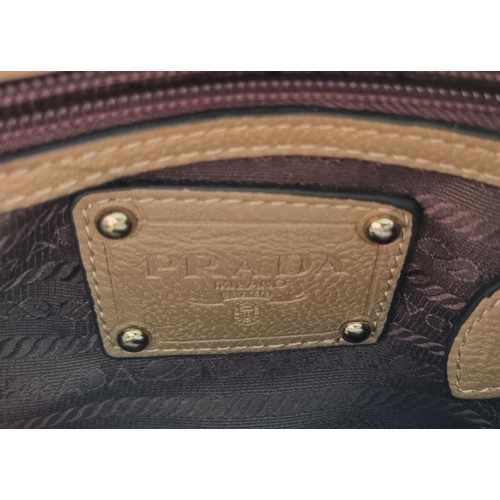 24 - A Prada Milano Brown leather Hand Bag.