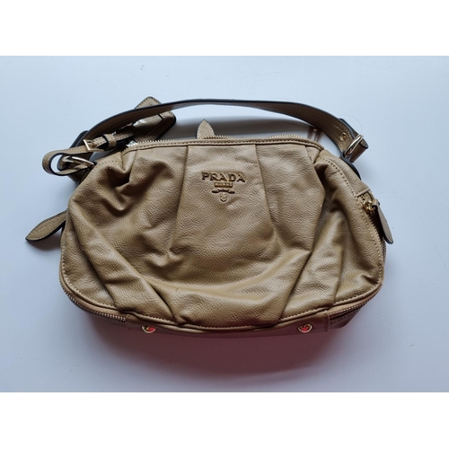 24 - A Prada Milano Brown leather Hand Bag.