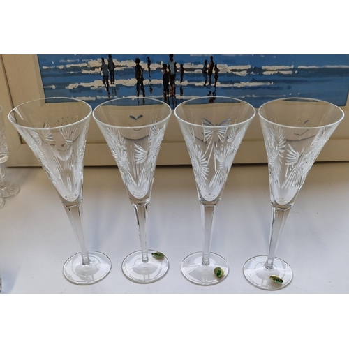 48 - A set of four Waterford Crystal Glasses. H 23 cm approx.