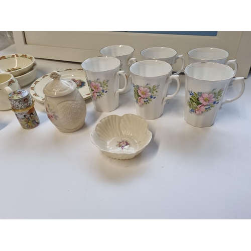 54 - A quantity of Royal Daulton Bunnykins Tableware, Royal Grafton Coffee Mugs along with other Items.