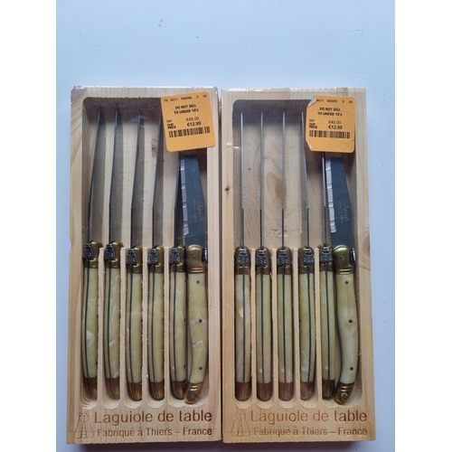 11 - A set of twelve Laguiole Steak Knives along with a Silver Plated Tray.