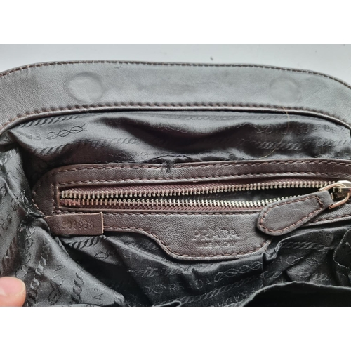 23 - A Prada Milano Brown leather Hand Bag.