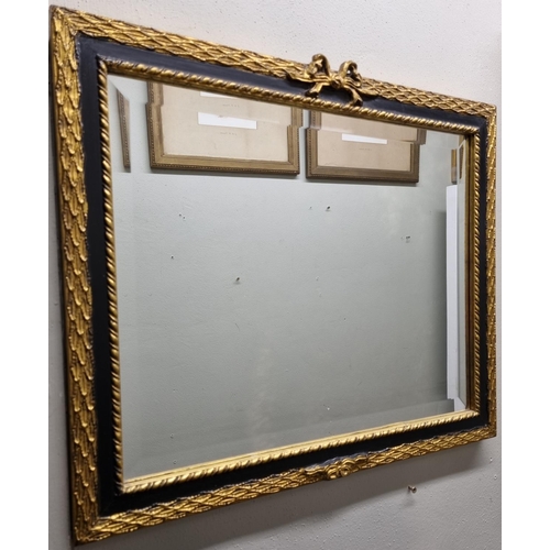 37 - A Gilt and Ebonised Wall Mirror along with another. 58 x 48 cm approx. and 58 x 68 cm approx.
