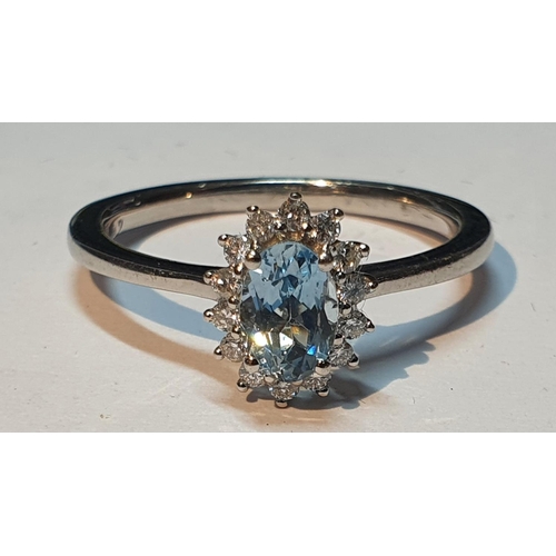 13 - 18ct gold topaz and diamond cluster ring, hallmarks for Sheffield, ring size L1/2, 2.5gms.