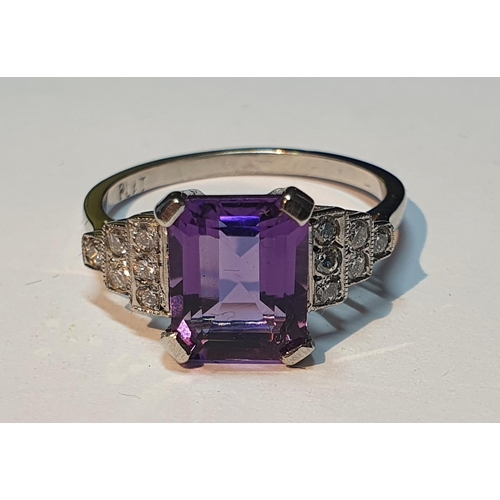 17 - An amethyst and brilliant-cut diamond ring. Amethyst calculated weight 2cts, based on estimated dime... 
