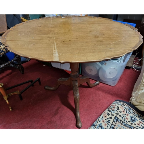 57 - A 19th Century scalloped edge Supper Table on tripod support.  Dia. 94 x H 69cms approx.