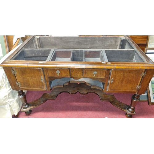 77 - A 19th Century possibly earlier walnut Base, fitted with an arrangement of drawers and cupboards, un... 