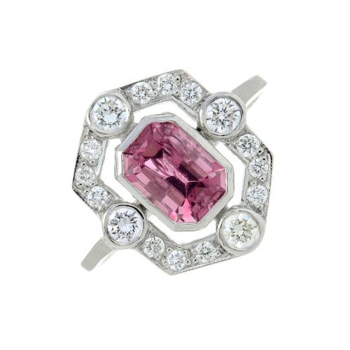 A pink tourmaline and brilliant-cut diamond cluster ring. Tourmaline calculated weight 1.10cts, based on estimated dimensions of 7 by 5 by 4mms.Estimated total diamond weight 0.30ct.Stamped Plat. Ring size N. 3.6gms.