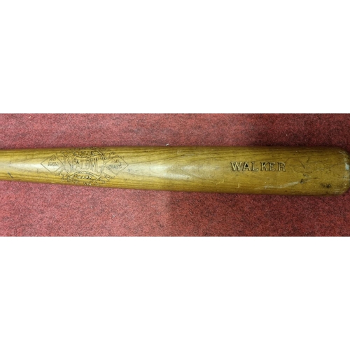 37 - A Spalding no 150n Baseball air dried Bat. with Walker engraved in the bat. H 85 cm approx.