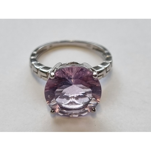 68 - A Silver and Amethyst Ring, size N1/2.