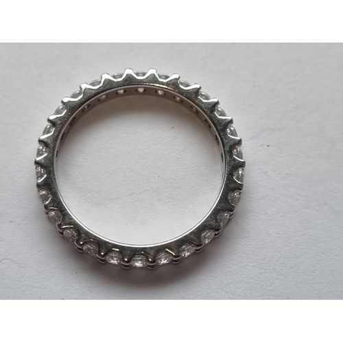 70 - A Sliver and CZ eternity Ring ( approx 1ct cz). Size M.