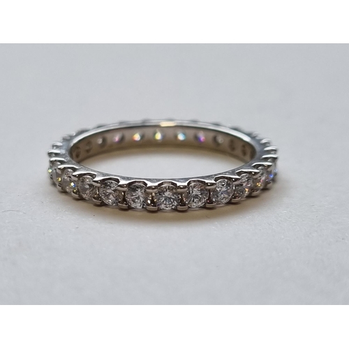70 - A Sliver and CZ eternity Ring ( approx 1ct cz). Size M.