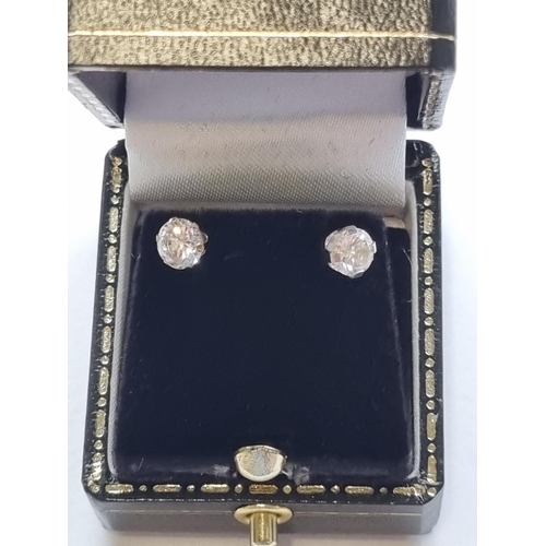 90 - A pair of 9ct Gold and CZ Stud Earrings.