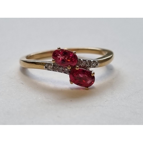 92 - A 10ct Gold, Diamond and Ruby set Ring. Size N.