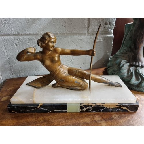 96 - A 1920's painted metal figure of Diane The Huntress on a marble base. H 16 x D 11 x W 18 cm approx.