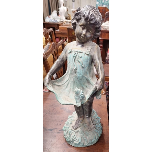 103 - A Bronze Figure of a Girl holding her skirt with a bird sitting. H 55 cms approx.