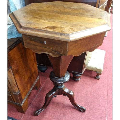 105 - A 19th Century Rosewood Workbox with fitted interior on tripod supports. H 69 x D 46 x W 46 cm appro... 