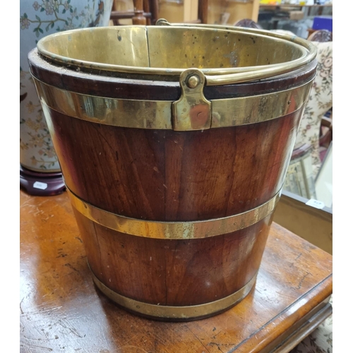 114 - A 19th Century Irish small Peat Bucket with brass liner. D 29 x H 30 cm approx.