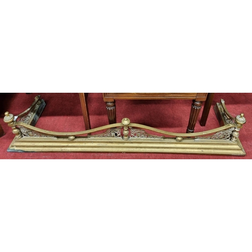 118 - A 19th Century Brass Fender of good proportions with turned finials. H 26 x D 38 x W 134 cm approx.