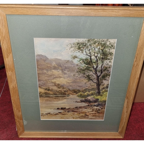 123 - An early 20th Century Watercolour of a river scene with mountainous background by W. Weir signed LR.... 