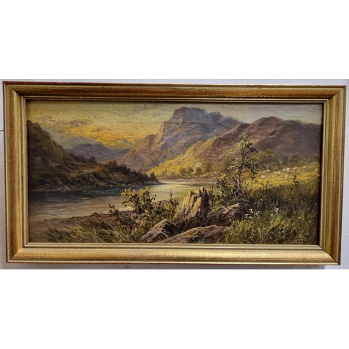 140a - A 19th Century Oil on Canvas by F E Jameson of a mountainous scene with river. Monogrammed LR. 20 x ... 