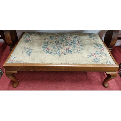 145 - A late 19th early 20th Century rectangular Stool with cabriole supports and tapestry style upholster... 